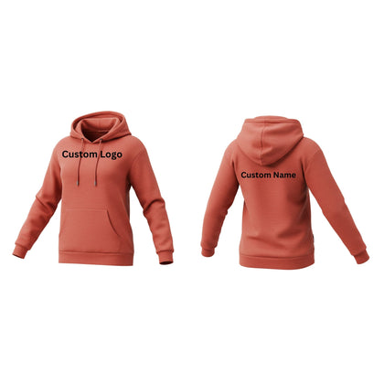 A woman wearing a fitted, high-quality fleece hoodie with a contoured design, standing in an active outdoor setting. Features include reinforced seams, a front pocket, and breathable fabric ideal for athleisure or workouts.